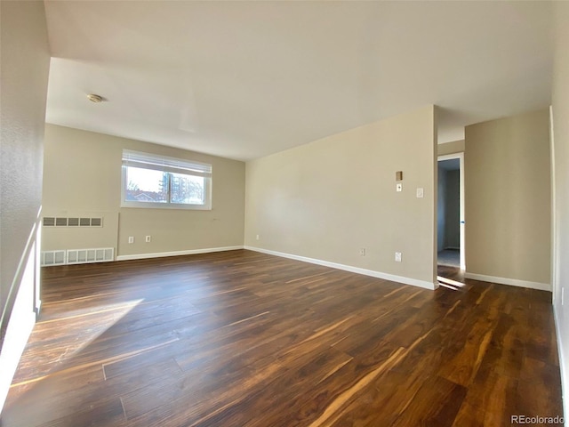1243 Gaylord St Unit 302, Denver, CO 80206 - empty room with dark wood-type flooring and a smoke detector