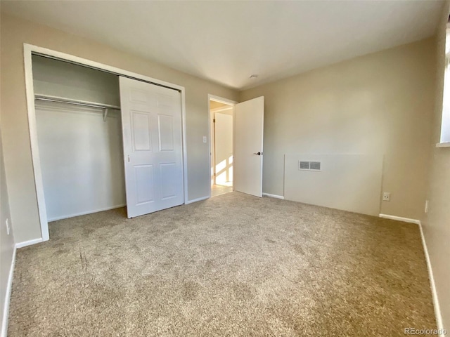 1243 Gaylord St Unit 302, Denver, CO 80206 - unfurnished bedroom featuring carpet flooring and a closet