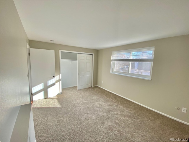 1243 Gaylord St Unit 302, Denver, CO 80206 - unfurnished bedroom with carpet and a closet