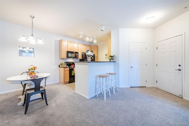 kitchen with light carpet, dark countertops, a kitchen breakfast bar, light brown cabinetry, and black appliances