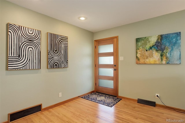 entryway featuring hardwood / wood-style flooring