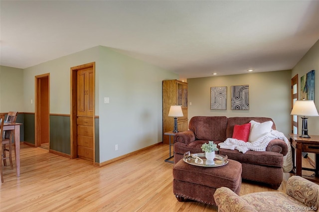 living room with light hardwood / wood-style flooring