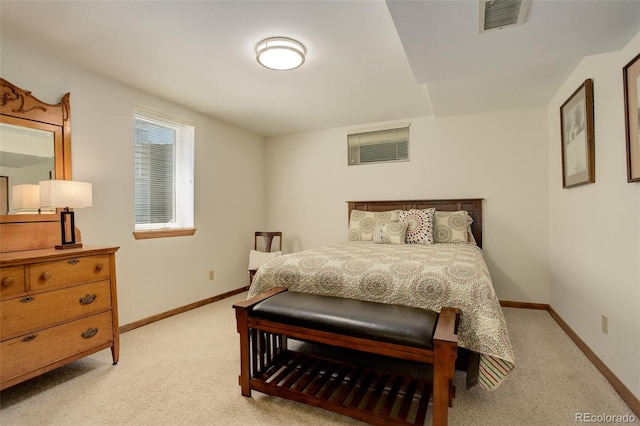 bedroom with light carpet