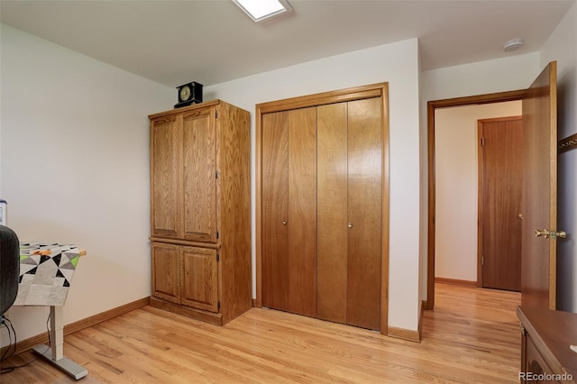 office space with light hardwood / wood-style floors