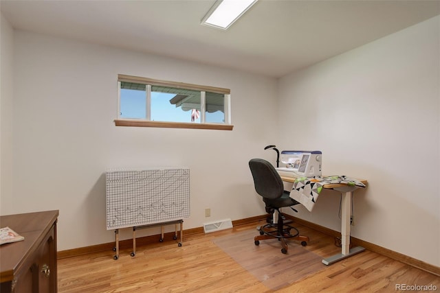 office featuring light hardwood / wood-style flooring