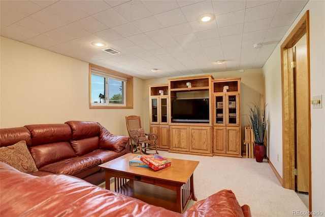 living room featuring light carpet