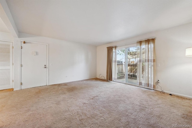 unfurnished room featuring carpet