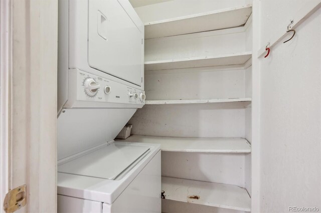 laundry area featuring estacked washer and dryer