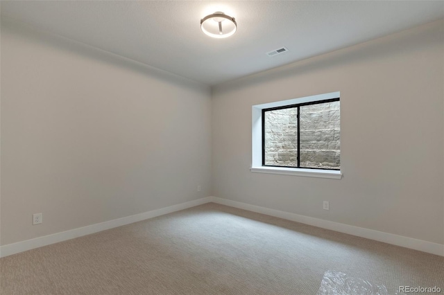 view of carpeted spare room