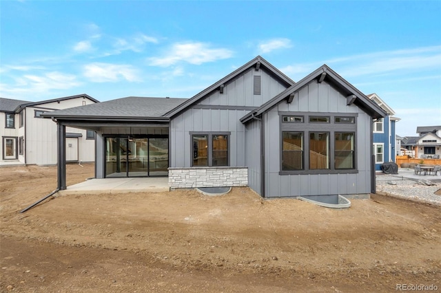 rear view of property with a patio area