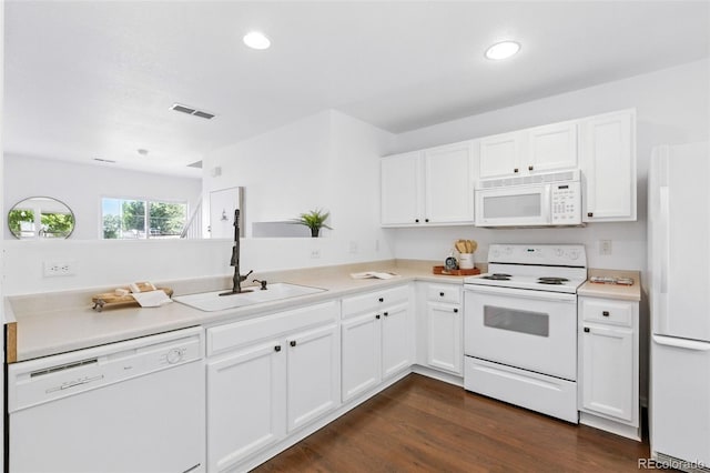 11898 W Tufts Pl, Morrison, CO 80465 - kitchen with white appliances, light countertops, white cabinetry, recessed lighting, and dark wood-style floors