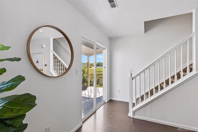 11898 W Tufts Pl, Morrison, CO 80465 - foyer entrance featuring stairway and wood finished floors