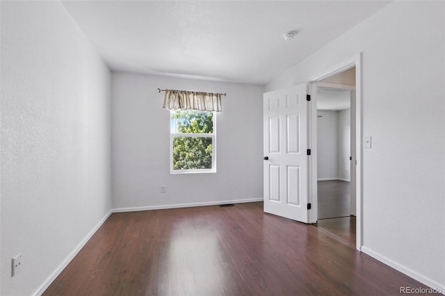 11898 W Tufts Pl, Morrison, CO 80465 - empty room with wood finished floors and a smoke detector