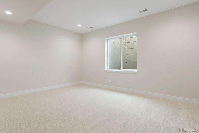 unfurnished room featuring carpet flooring