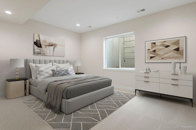 bedroom featuring light colored carpet