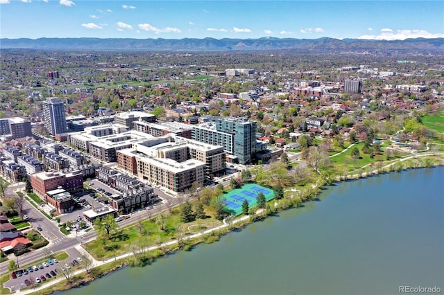 bird's eye view with a city view and a water and mountain view