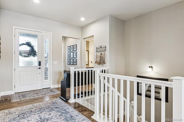 entryway featuring dark wood-type flooring