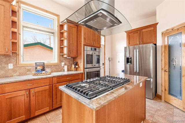 kitchen with a center island, appliances with stainless steel finishes, exhaust hood, and open shelves