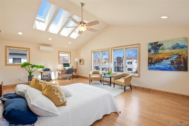 bedroom featuring a skylight, recessed lighting, high vaulted ceiling, and a wall unit AC