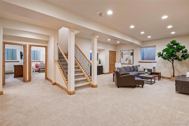 living room featuring recessed lighting, stairs, light colored carpet, and baseboards
