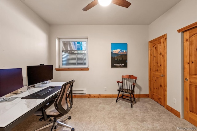 home office featuring carpet floors, baseboards, and a ceiling fan