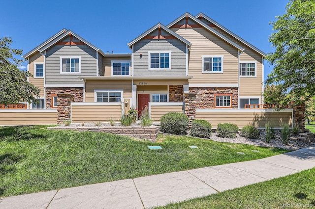 12856 Jasmine St Unit E, Thornton, CO 80602 - view of front of home with stone siding