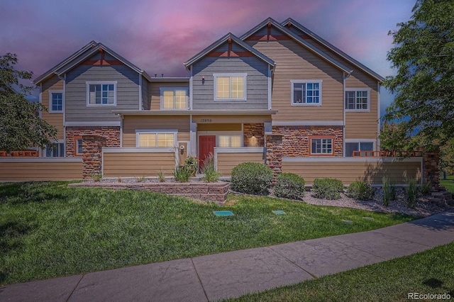 12856 Jasmine St Unit E, Thornton, CO 80602 - view of front of home with stone siding