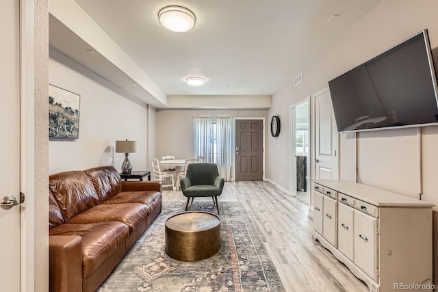 12856 Jasmine St Unit E, Thornton, CO 80602 - living room with light wood-style flooring