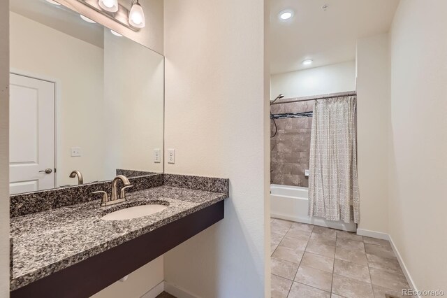 12856 Jasmine St Unit E, Thornton, CO 80602 - bathroom with shower / bath combo, vanity, recessed lighting, and tile patterned floors