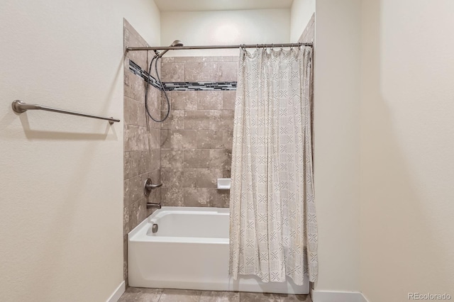 12856 Jasmine St Unit E, Thornton, CO 80602 - bathroom featuring shower / bath combination with curtain and tile patterned flooring