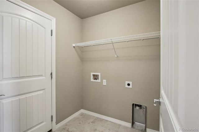 washroom with baseboards, hookup for an electric dryer, laundry area, and hookup for a washing machine