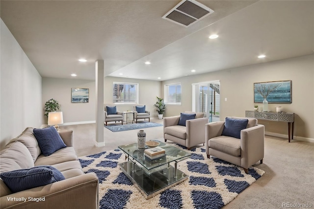 living room featuring visible vents, recessed lighting, carpet, and baseboards