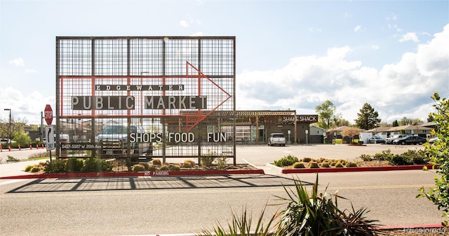 2235 Eaton St, Edgewater, CO 80214 - view of building exterior featuring uncovered parking