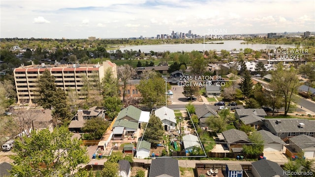 2235 Eaton St, Edgewater, CO 80214 - aerial view of residential area with property boundaries highlighted and a large body of water