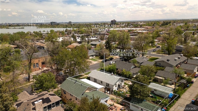 2235 Eaton St, Edgewater, CO 80214 - aerial perspective of suburban area featuring property parcel outlined and a nearby body of water