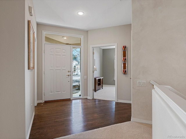 foyer with dark wood-type flooring