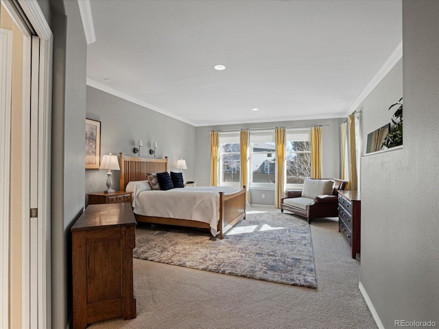 carpeted bedroom with ornamental molding