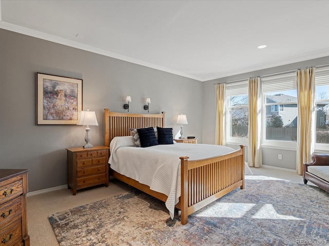 carpeted bedroom with ornamental molding