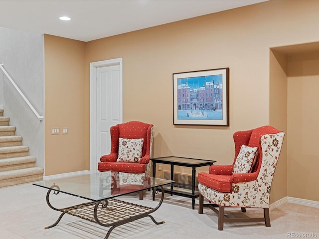 sitting room with carpet floors