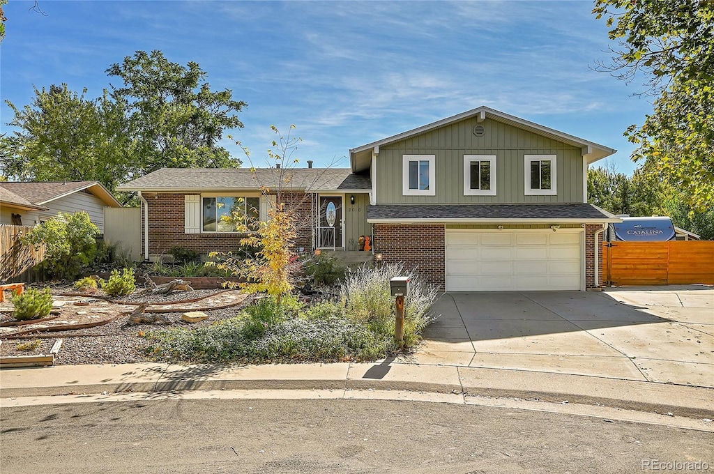 tri-level home featuring a garage