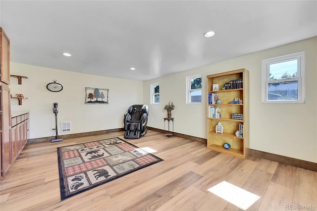 sitting room featuring light wood-type flooring