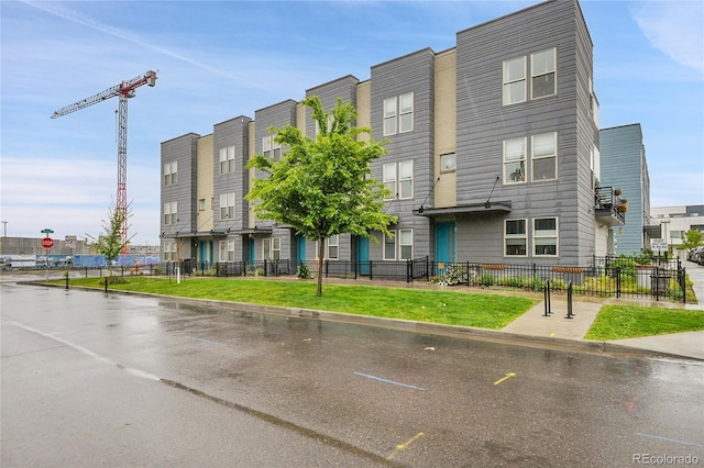 1285 W 9th Ave, Denver, CO 80204 - view of building exterior with fence
