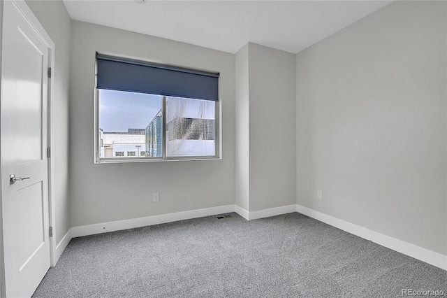 1285 W 9th Ave, Denver, CO 80204 - empty room with carpet and baseboards