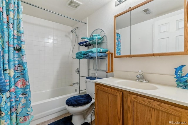 bathroom with visible vents, toilet, vanity, and shower / bath combination with curtain