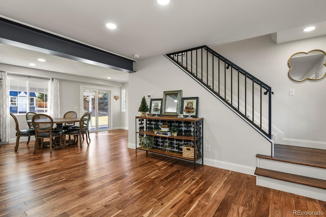 7404 La Quinta Ln, Lone Tree, CO 80124 - stairs featuring baseboards, wood finished floors, and recessed lighting
