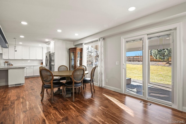 7404 La Quinta Ln, Lone Tree, CO 80124 - dining area with dark wood-style floors, recessed lighting, and baseboards