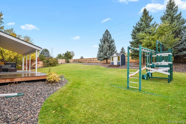 7404 La Quinta Ln, Lone Tree, CO 80124 - view of yard featuring a playground and a wooden deck