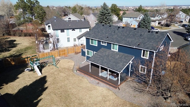 7404 La Quinta Ln, Lone Tree, CO 80124 - back of property with a residential view and a shingled roof
