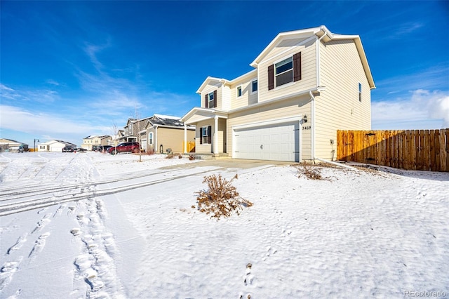 view of front of property with a garage