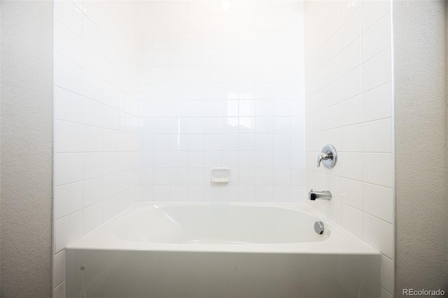 bathroom with a bathing tub